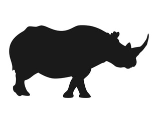 Silhouette of a rhino walking about to go somewhere 