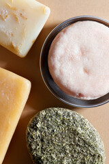 Fresh natural soap and solid shampoo bars close-up. Concept of organic cosmetic