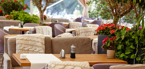 Restaurant or cafe with cozy interior. View of modern dinning room interior