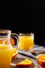 table full of fresh oranges and juice in springtime