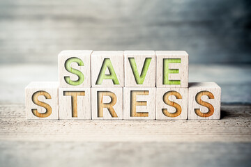 Fototapeta premium Save Stress Written On Wooden Blocks On A Board