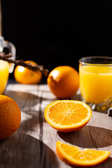 table full of fresh oranges and juice in springtime