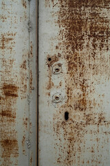 Rusty metal door texture, keyhole close up