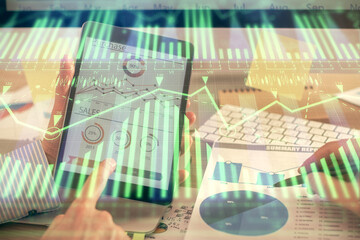 Multi exposure of man's hands holding and using a digital device and data theme drawing. Innovation concept.