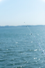 釣竿（ロッド）と海　フィッシングイメージ