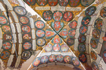 Prague, Czech Republic - May 2019: Decorated ceiling  of a room in old royal palace of Prague castle