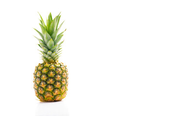 Ripe and delicious pineapple on white background