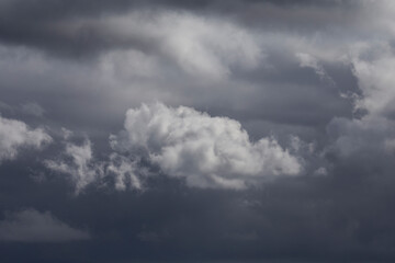 Obraz premium Cloudy dark blue sky abstract background in a stormy day.