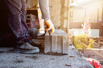 construction worker on site with blocks,  Work safety