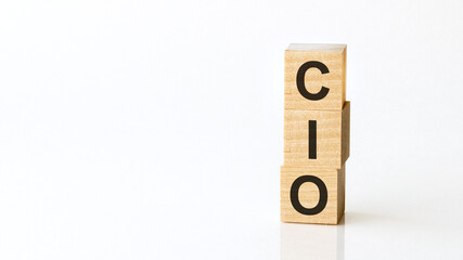cio - acronym from wooden blocks with letters, chief information officer, white background
