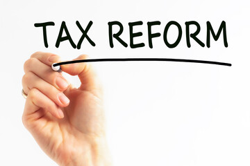 Hand writing inscription TAX REFORM with marker, concept, stock image