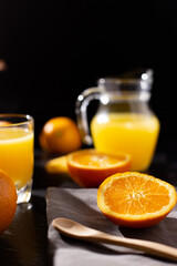 table full of fresh oranges and juice in springtime