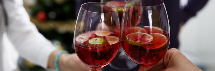 Cocktail glasses are connected together. Celebrating important events