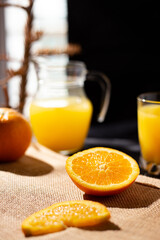 table full of fresh oranges and juice in springtime