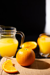 table full of fresh oranges and juice in springtime