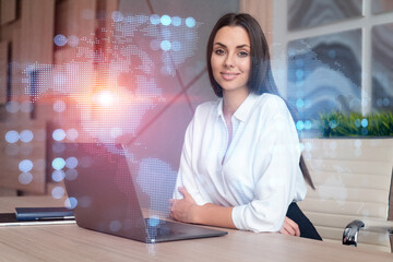 Attractive businesswoman in white shirt at workplace working with laptop to hire new employees for international business consulting. HR, social media hologram icons over office background