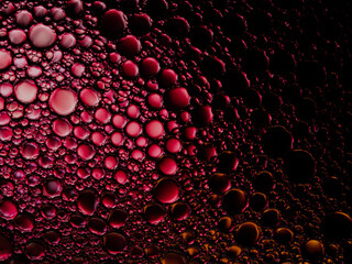 Oil bubbles on the water surface