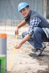 builder working outdoors at construction site