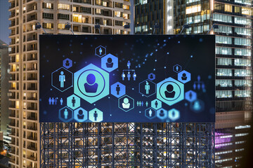 Glowing Social media icons on billboard over night panoramic city view of Bangkok. The concept of...