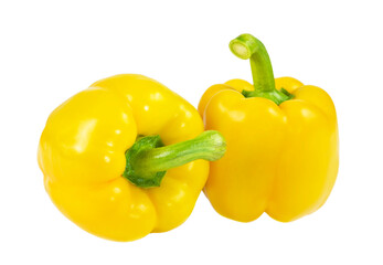 Two yellow bell peppers close-up isolated on a white background.