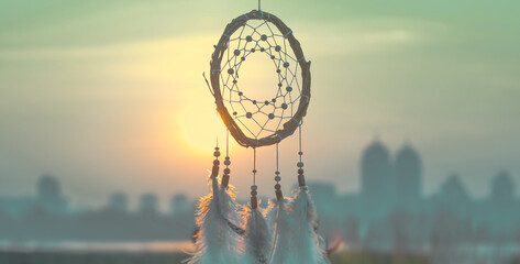 Dream catcher on the background of the city. Far from the bustle of the city. Horizontal...