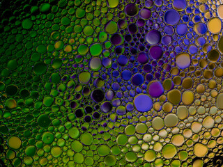 Oil bubbles on the water surface