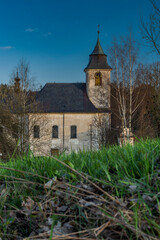Fototapeta na wymiar View for Roprachtice village with old church in spring nice sunny evening