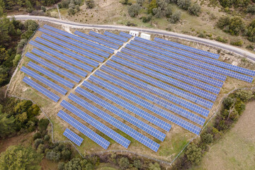 Solar panels fields on mountains for solar power. Renewable and green energy resource.