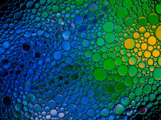 Oil bubbles on the water surface