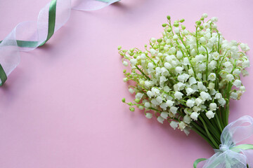 postcard mockup. small spring bouquet of lilies of the valley and space for text