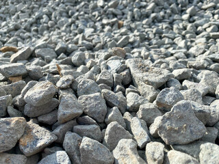 Photo background stones rubble and wall. The texture of the stones is gray and white