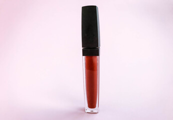 Liquid lipstick open tube and lipstick smear smudge isolated on white background. Makeup...