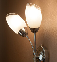 Lighted classic sconce on the wall