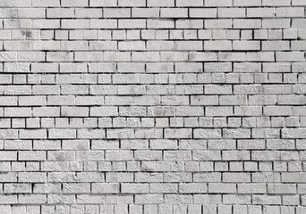 White brick wall background with rough texture