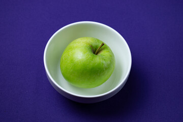 green apple in a bowl
