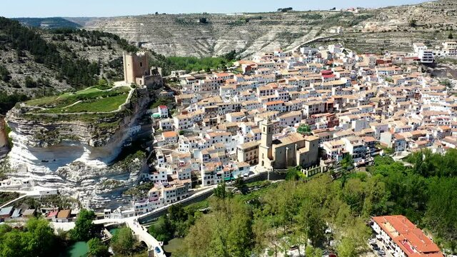 The beautiful medieval Spanish town of Alcal&aacute; del J&uacute;car as seen from a drone.