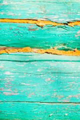 The wall of an old wooden painted house