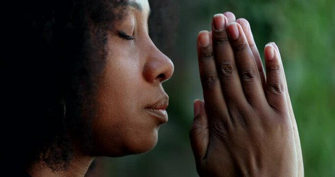 African woman praying to God
