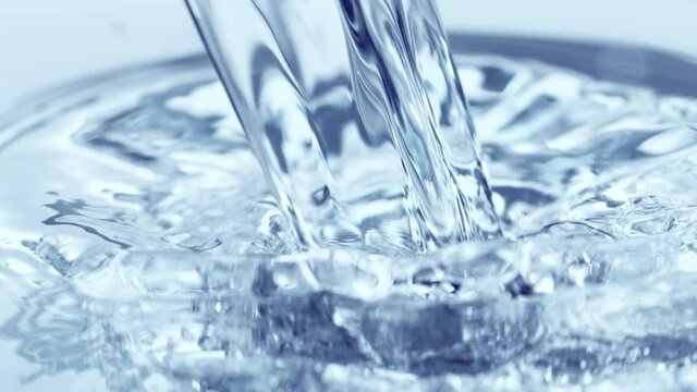 Super Slow Motion Shot of Pouring and Splashing Water at 1000 fps.