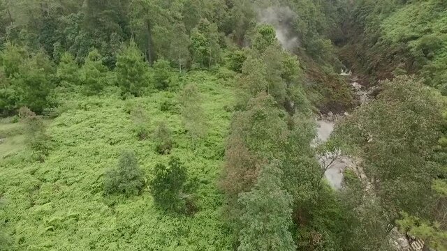 Fumarole gas phenomenon aerial view in ground landscape of volcano