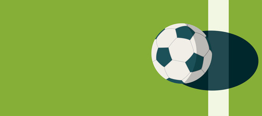 Obraz premium soccer ball standing near the center line on the green field