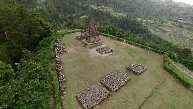 Isolated hindu temple aerial footage view with green trees landscape view