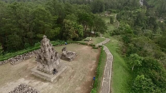 Cinematic aerial footage view Hindu temple from drone flying parallax point of view movement