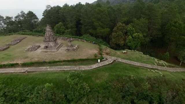 Beautiful aerial footage view Hindu Temple in Bandungan hill, Central Java, Indonesia. Shot from drone flying trucking shot