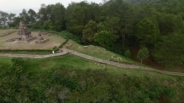 Beautiful aerial footage view Hindu Temple in Bandungan hill, Central Java, Indonesia. Shot from drone flying trucking shot