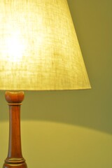 dim lighting room of the mahogany antique lamp. 

This expensive furniture is made in England. 
blurred background soft focus image.
