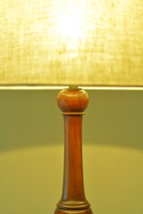 dim lighting room of the mahogany antique lamp. 

This expensive furniture is made in England. 
blurred background soft focus image.