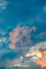 Fototapeta na wymiar pink cloud on a blue sky