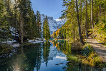 The beautiful Braies lake in late autumn with a little snow, Pearl of the Dolomite lakes is an UNESCO heritage and is located in the Braies Alto Adige,Italy