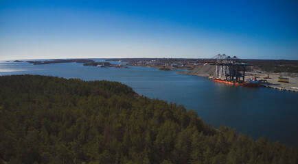 Stockholm Norvik Port, Sweden, 2020-03-18: Aerial view of installing new cranes, shipped from China to Sweden. High quality photo